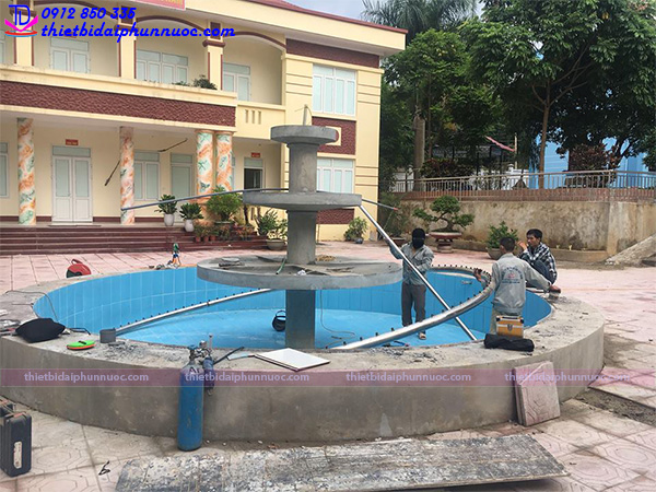 Đài phun nước xi măng tháp tràn 8